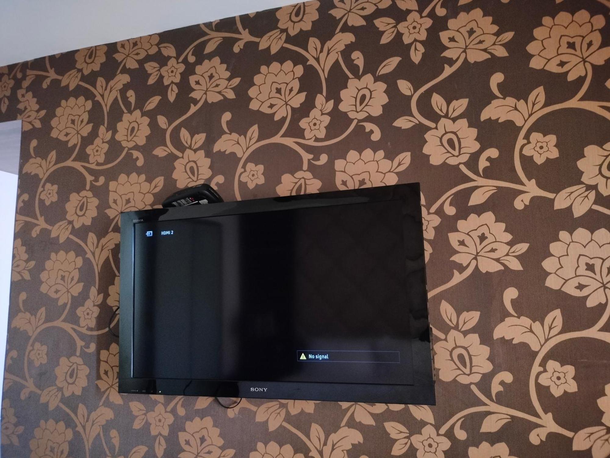 Holiday Inn Chandigarh Panchkula, An Ihg Hotel Esterno foto A television mounted on a wall